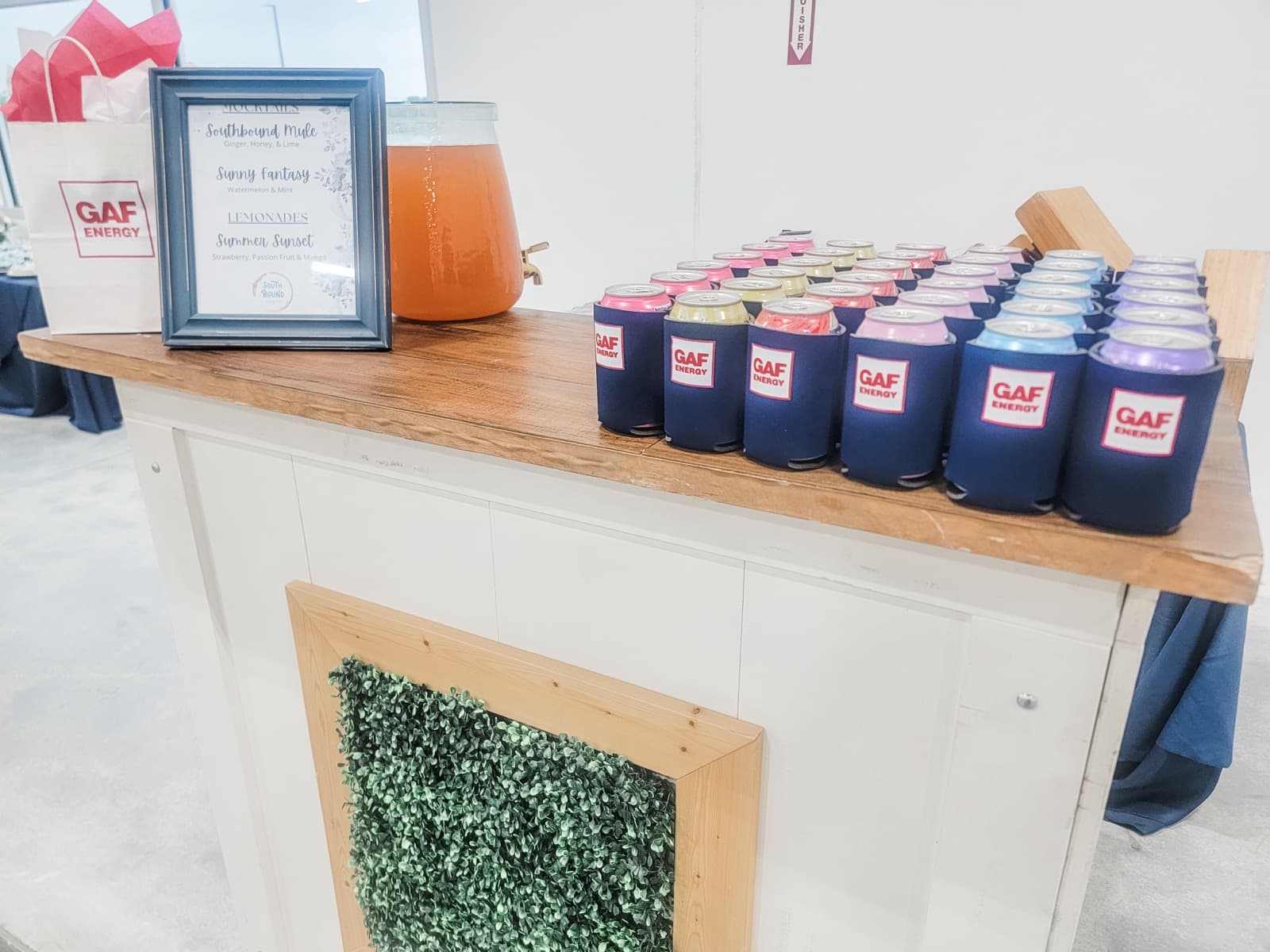 Southbound Sips corporate event bar setup with custom drink menu