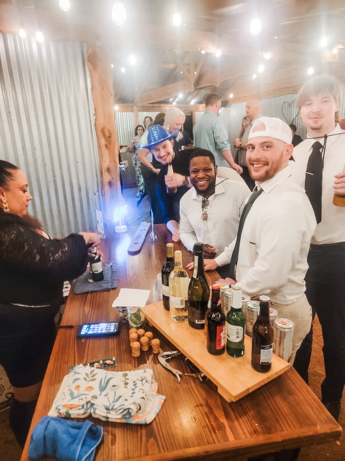 Wedding guests enjoying drinks at Southbound Sips bar